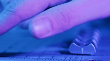 Close up of switches on a mixing console getting moved. 4K