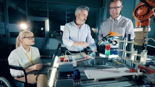 Robotics Lab Group Engineers Smiling While Working — Vídeo de Stock