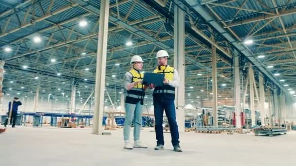 Fiberglass Factory Two Engineers Observing Premises — стоковое видео
