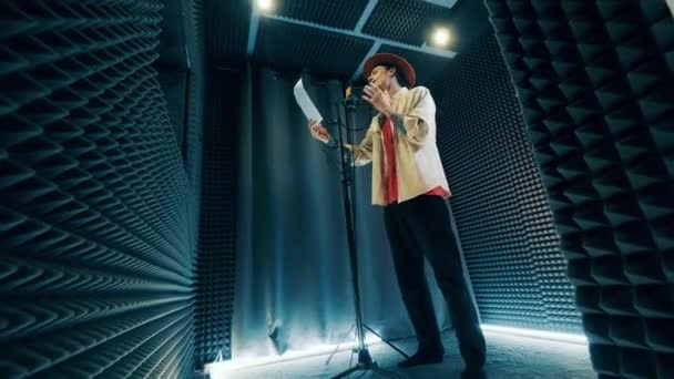 Male Musician Singing Passionately Recording Booth — Stock videók