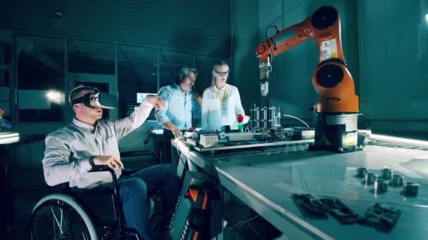 Disabled Technician Using Control Robotic Arm — Stock Video