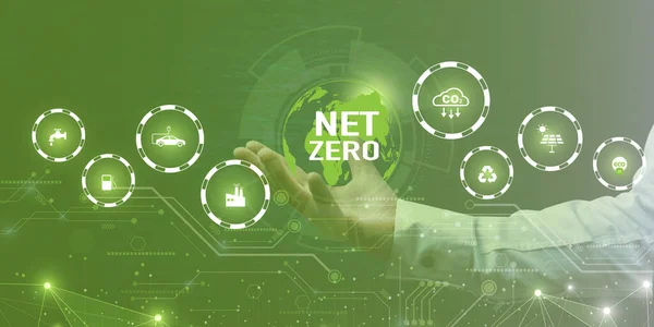 Businessman Holding icon Net Zero and Carbon Neutral Concepts Net Zero Emissions Goals With a connected icon concept related to Net Zero with hexagon grid.