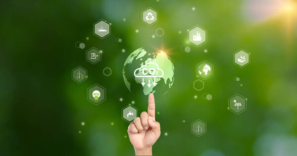 CO2 emission reduction concept.world icon in hand with environmental icons, Ideas for Sustainable development, and green business based on renewable energy. Energy saving, Sustainable development.