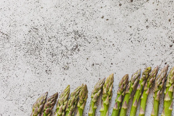 stock image Fresh Asparagus. Green fresh raw asparagus on rustic wooden table