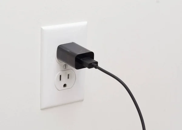 Stock image Electrical wall outlet and usb adapter plug