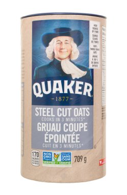 Pleasant Valley, Canada - January 26, 2023: Quaker steel cut oats container. Quaker Oats is an American food company based in Chicago.