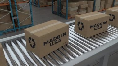 Cardboard boxes with Made in USA on conveyor belt line isolated on warehouse background