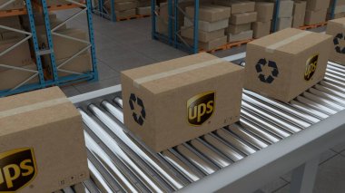 Istanbul,Turkey - 01.01.2023:Cardboard boxes with Ups Logo on conveyor belt line isolated on warehouse background.3D Animation