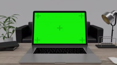 Mock-up Green Screen Laptop Standing on the Desk in the Modern Creative Office. Camera Zoom-in Movement.