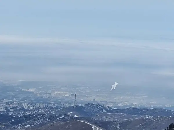 view of the city in winter. air pollution in the city