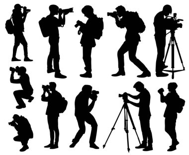 Fotoğrafçı elinde kamera silueti tutuyor.