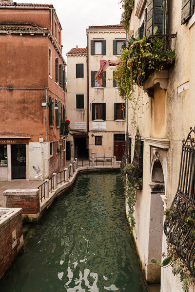 Typical street canal and architecture in Venice, Italy 