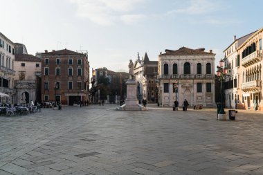 Open square space and typical architecture in Venice, Italy 