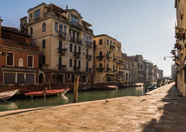 Colorful architectural details and gothic Venetian Architecture in Venice, Italy by a canal