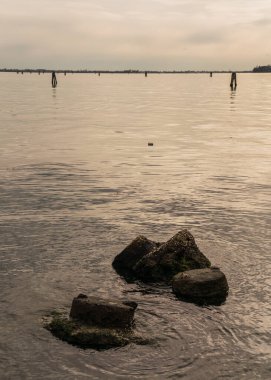 Calm water lagoon in Venice, Italy