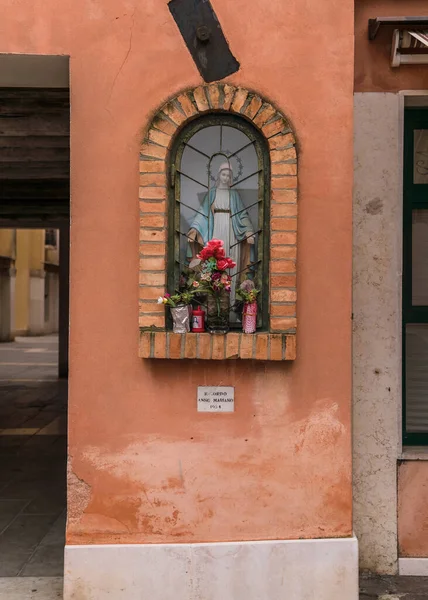 Virgin Mary shrine on the street in Venice, Italy 