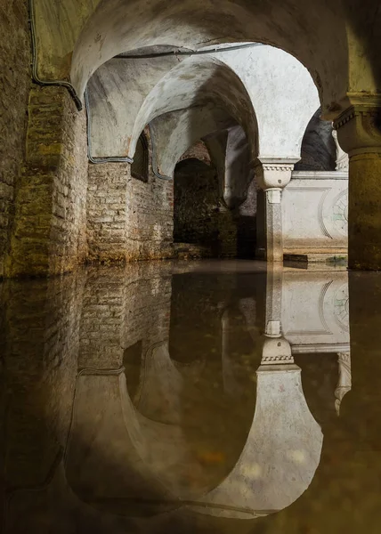 flooded crypt in a Catholic church in Venice, Italy