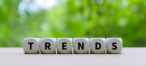 White letter block with "Trends" written on it, 3d rendering