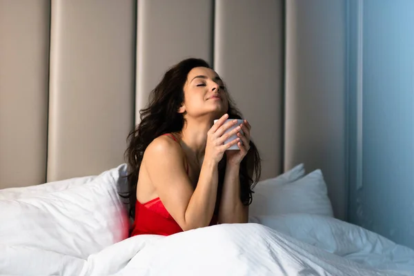 Portrait Caucasian Attractive Young Sexy Woman Sitting Bed Red Sleepwear — Fotografia de Stock