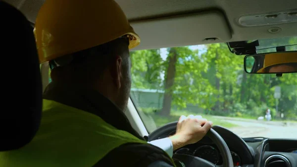 Rear Man Worker Yellow Helmet Uniform Driving Car Construction Site — Stockfoto