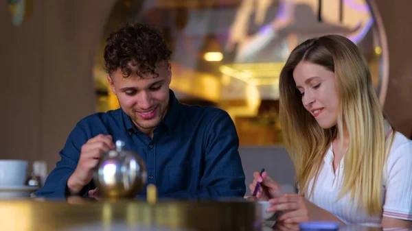 Close Caucasian Joyful Young Man Woman Smiling Eating Restaurant Indoors — Stock fotografie