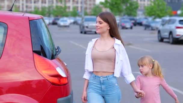 Happy Young Mother Walking Parking Her Daughter Lady Open Car — Stock Video