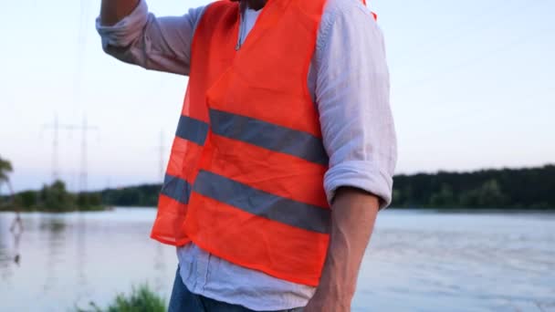 Engineer Taking Safety Helmet Standing River Outdoors Cropped Close High — Stock Video