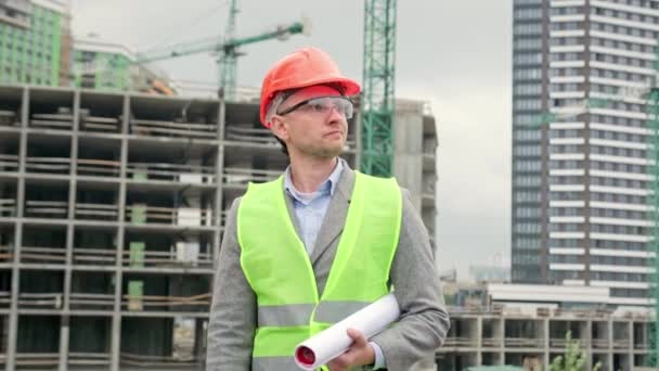 Builder Protective Clothes Vest Helmet Walking Building Holding Blueprints Slow — Stock videók