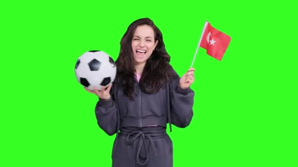 Happy Young Female Fan Posing Turkish Flag While Holding Soccer — Stockvideo