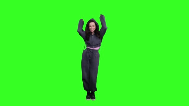 Smiling Pretty Lady Enjoying While Dancing Shaking Hands Jumping Green — стокове відео