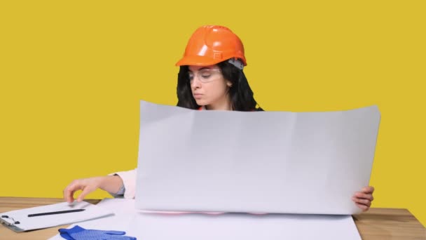 Young Woman Protective Helmet Working Drawing Sitting Desk Making Notes — Stok Video