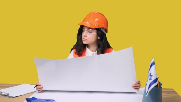 Female Architect Protective Glasses Yellowprints While Making Notes Yellow Isolated — Stok Video