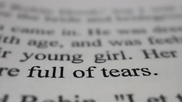 Full Tears Text Open Book Page Selective Focus Close Macro — Stock Photo, Image