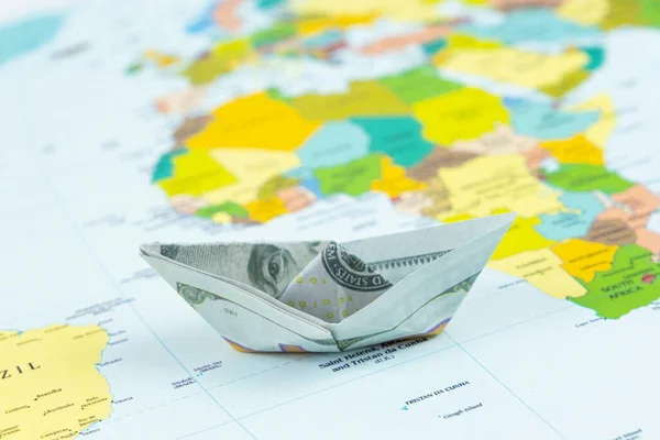 Paper Ship Made Dollars World Map Ship Transportation Concept American Royalty Free Stock Images