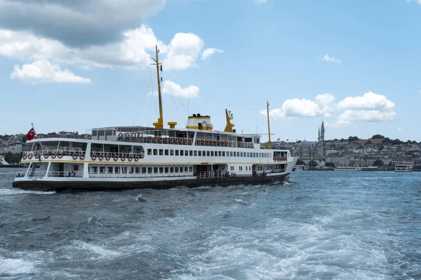 stock image Istanbul view with a ferryboat in Bosphorus, beautiful landscape with sea and cloudy sky, ship on the sea, marine concept, travel with ferry tour in Istanbul, cityscape with Marmara sea