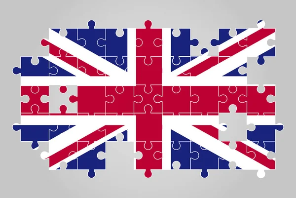 ジグソーパズルベクトル パズルマップ 子供のためのイギリスの旗のイギリスの旗の形 — ストックベクタ