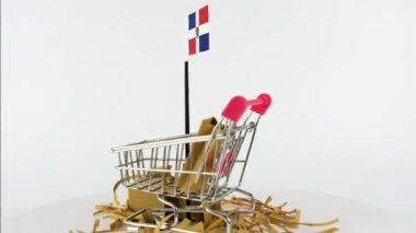 Dominik Cumhuriyeti bayrağı süpermarket el arabası ve karton kutu videosu, 4K 60 fps, çevrimiçi pazarlama, alışveriş konsepti, dış ticaret fikri, Dominik 'te ürün satmak, e-ticaret videosu çevirmek