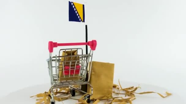 Bósnia Herzegovina Bandeira Com Supermercado Carrinho Mão Caixas Papelão Vídeo — Vídeo de Stock