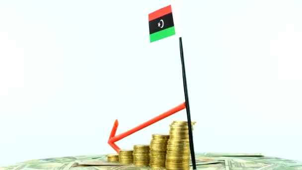 リビアはターンテーブル上のコインでフラグを立て インフレコンセプトビデオ 赤矢印 経済と金融のアイデア リビアは値を減少させ 国の統計 Fps 経済危機と格下げ — ストック動画
