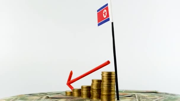 朝鲜国旗上刻有可换货币 通货膨胀概念视频 红色箭头 经济和金融理念 朝鲜贬值 国家统计 Fps 经济危机和降级 — 图库视频影像