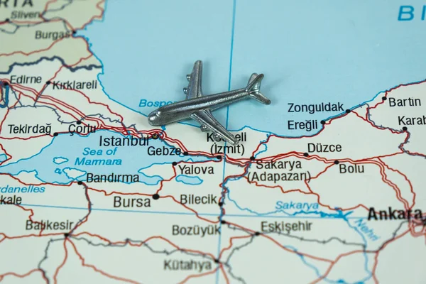 Air transportation to Istanbul transfer center airport, miniature Airliner going to Istanbul Turkey, plane on turkey map, air transportation concept
