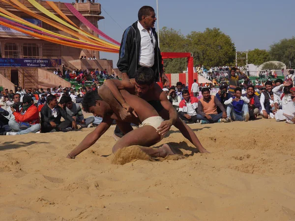 stock image Bikaner Rajasthan, India : January 14, 2018  Traditional wrestling match competition also known as kushti in india at Bikaner festival.