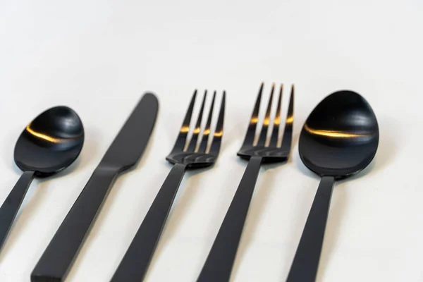 白色背景上的黑色金属叉和勺子 美洲墨西哥 — 图库照片
