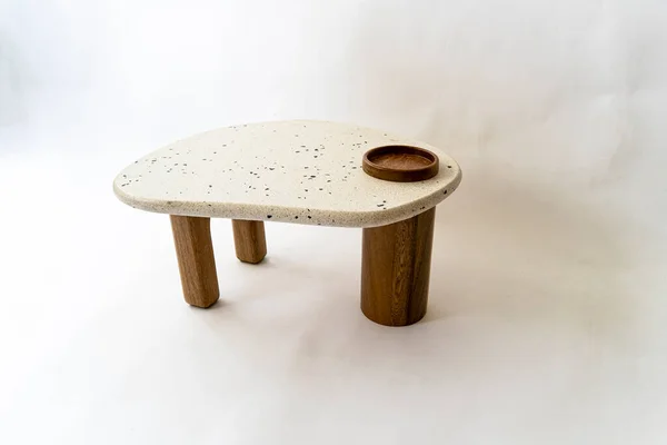 designer coffee table, solid wood base and top in terrazzo, oak wood on white background, mexico latin america