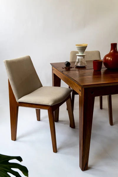 designer wood dining table, minimalist and simple objects on the table, mexico latin america