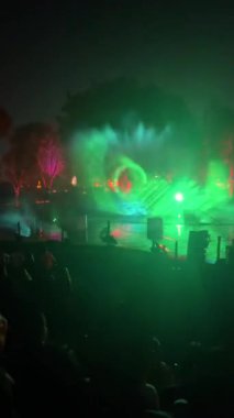 video and image projection in a water fountain on the day of the dead in mexico, latin america