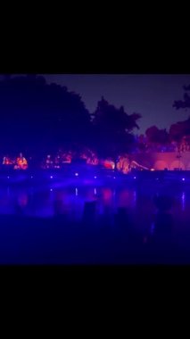 video and image projection in a water fountain on the day of the dead in mexico, latin america