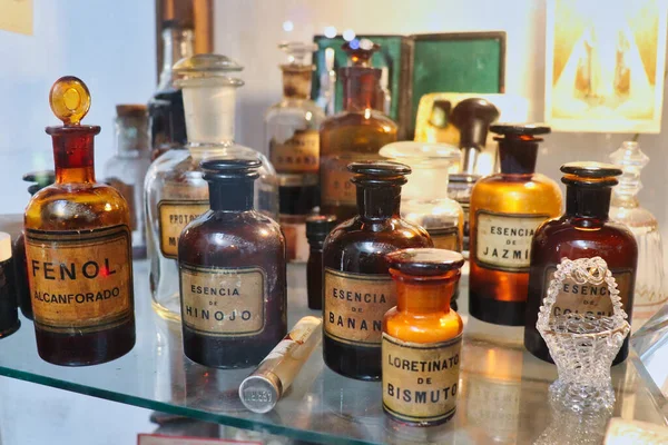 stock image old pharmacy and perfumery bottles of medicines and fruit essences