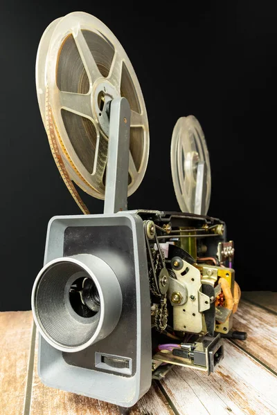 old 8mm home cinema projector with its electronic components visible