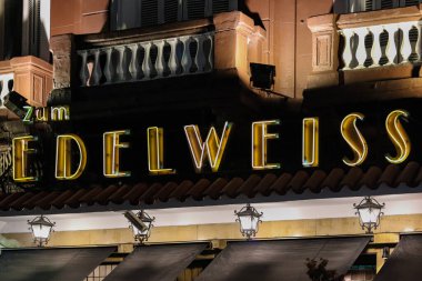 sign of the traditional Zum Edelweiss restaurant on Libertad Street in Buenos Aires clipart